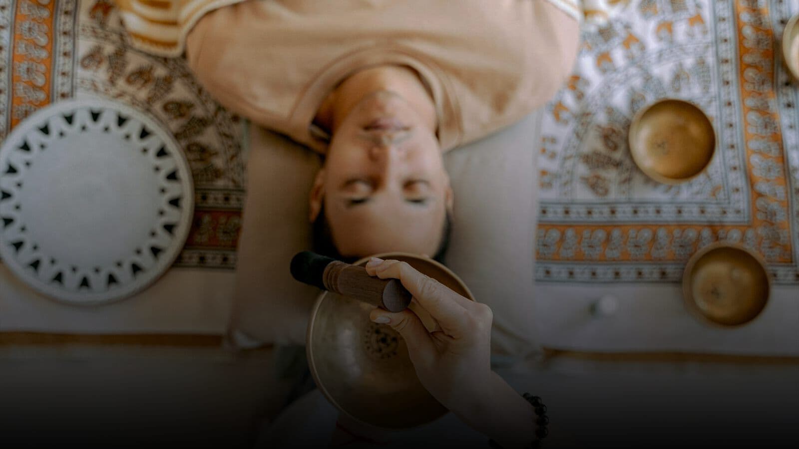 A singing bowl session in progress