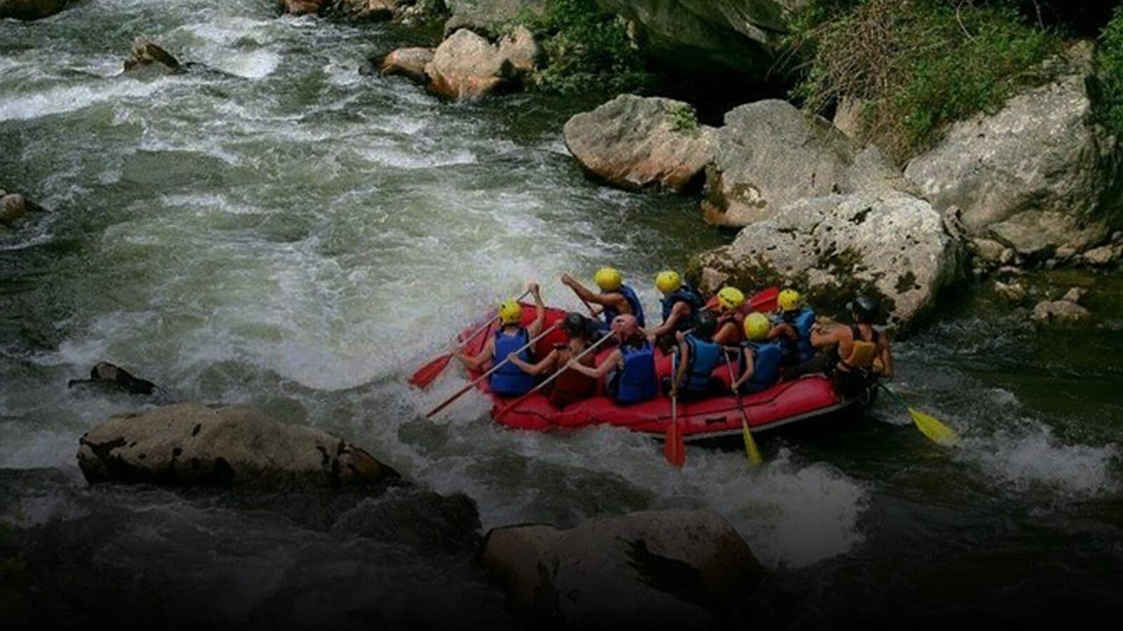 A raft running the rapids on the Kelani