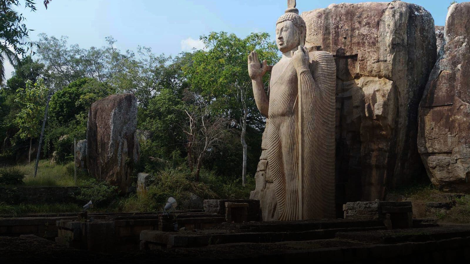 The Aukana Buddha carved from a granite face
