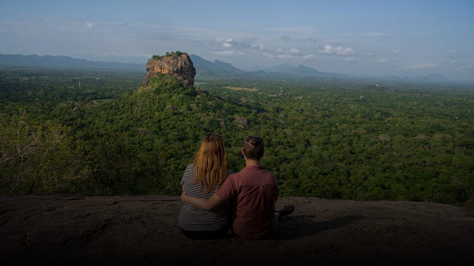 Two travellers looking across to Sigiriya from Pidurangala