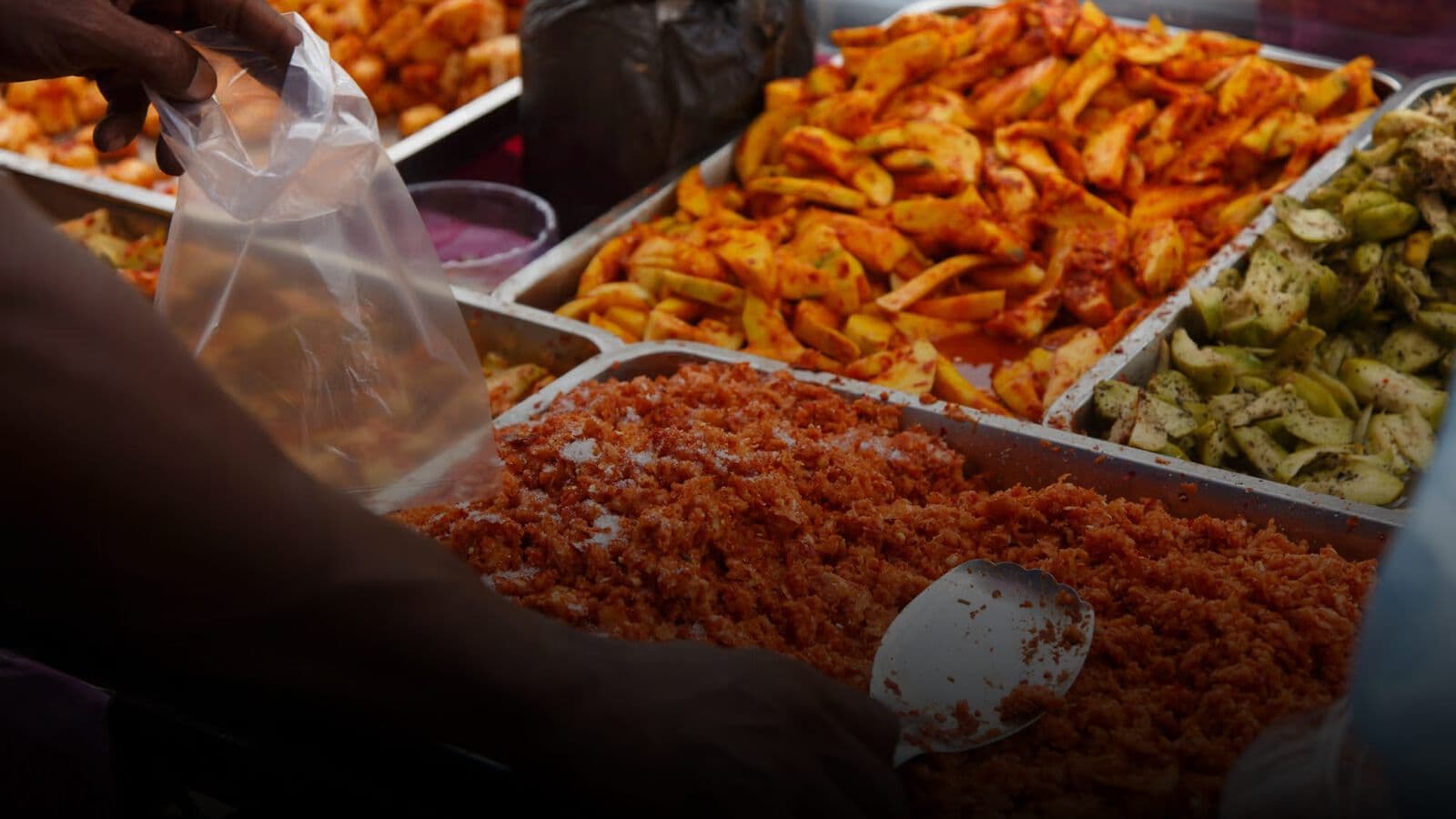 A street food stall serving kottu and short eats