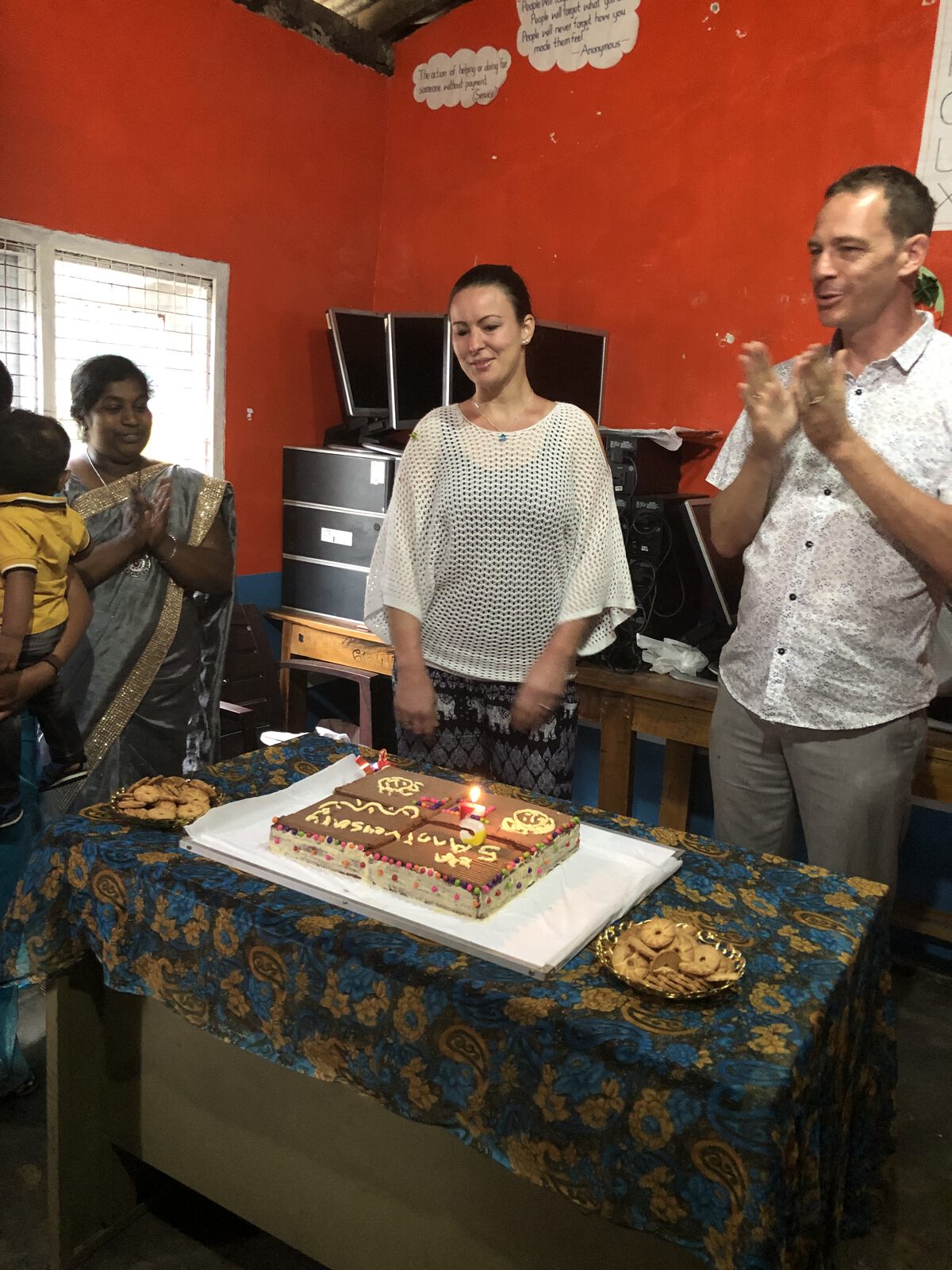 Cutting a cake at a family celebration